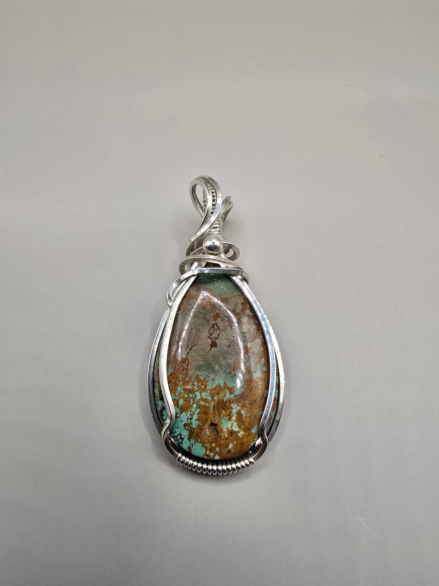 Bisbee ll turquoise sterling silver wirewrap