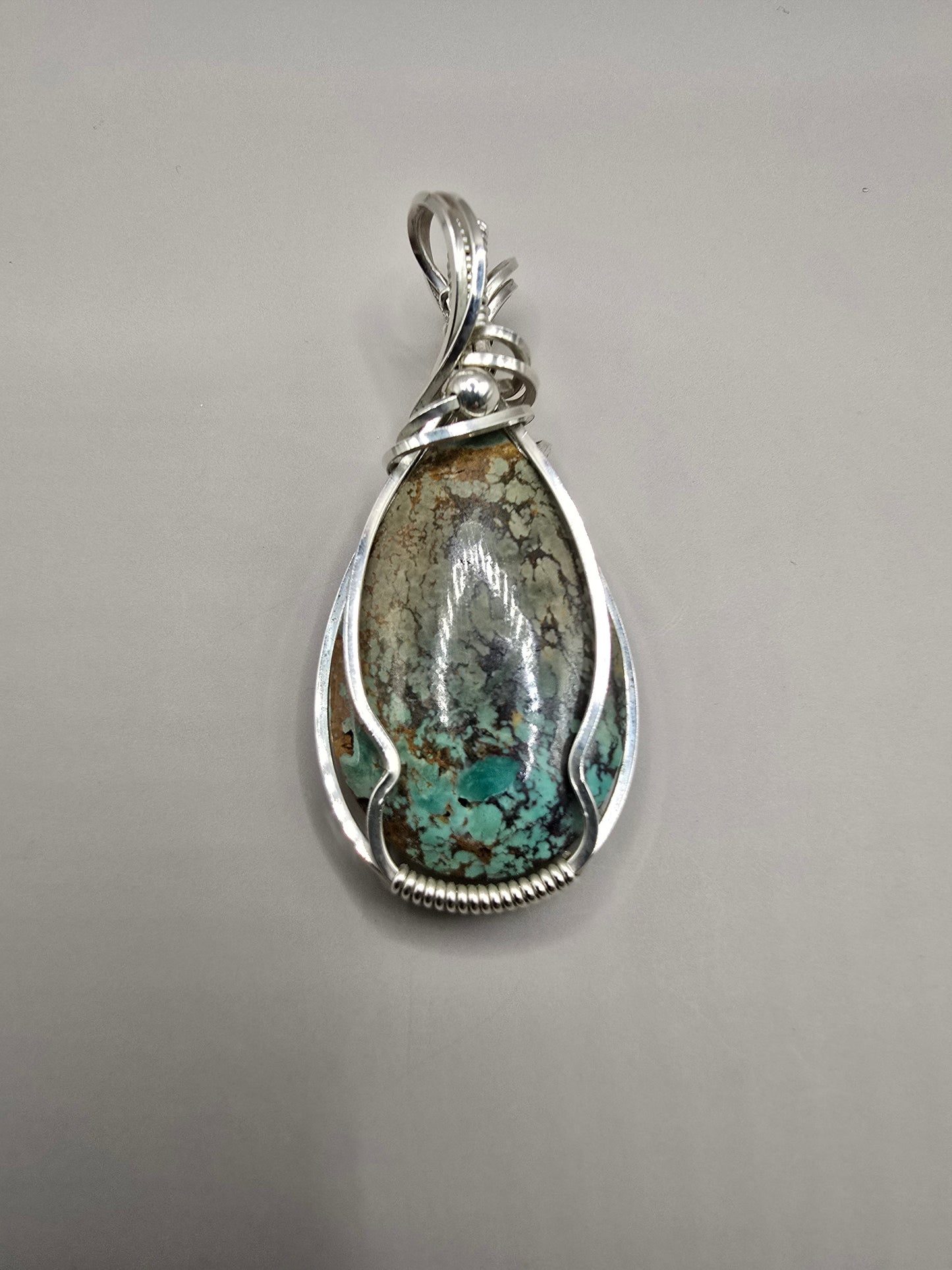 Bisbee ll turquoise sterling silver wirewrap