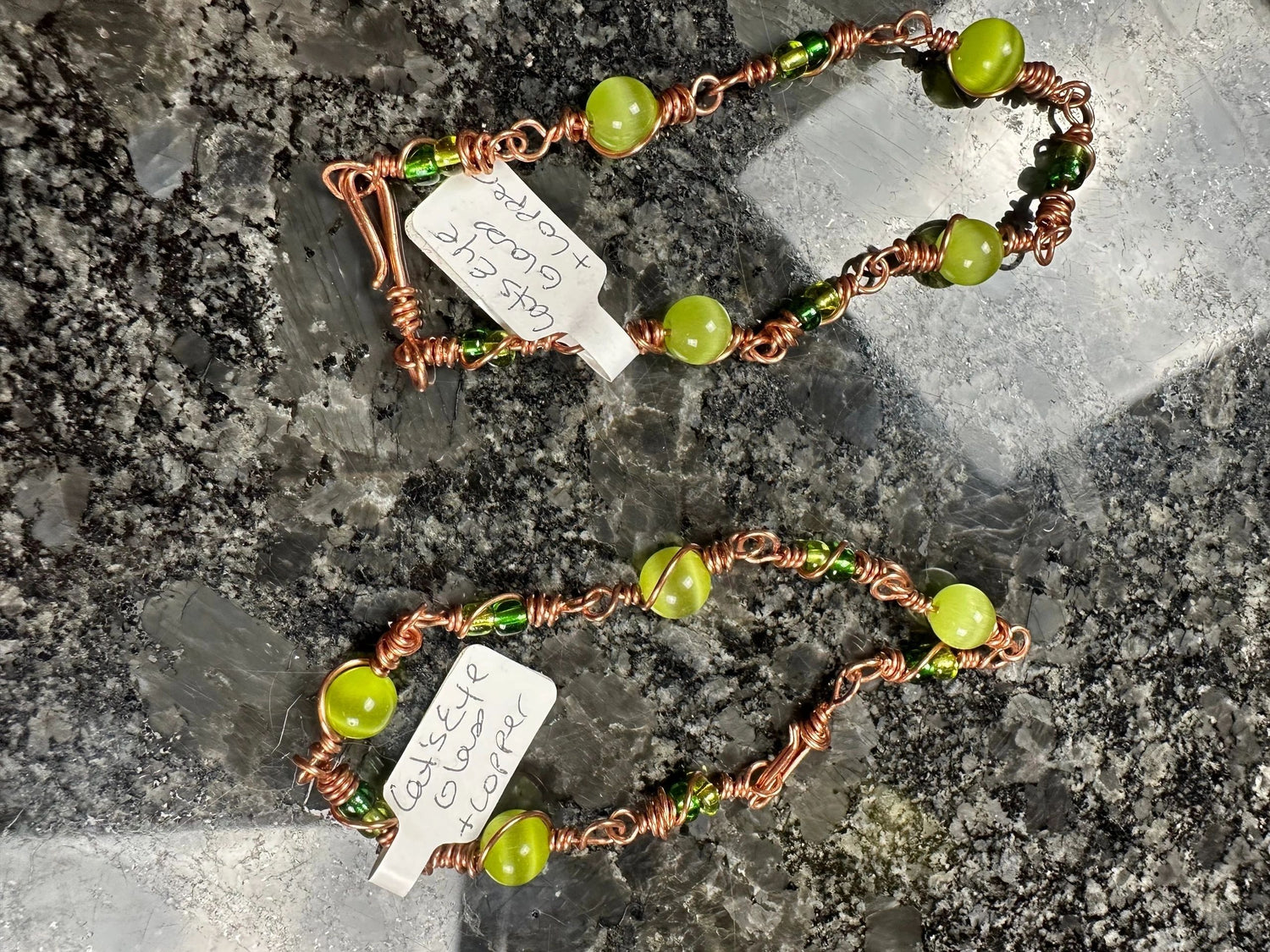 Green Cat's Eye wire wrapped bracelet with glass beads on copper wire