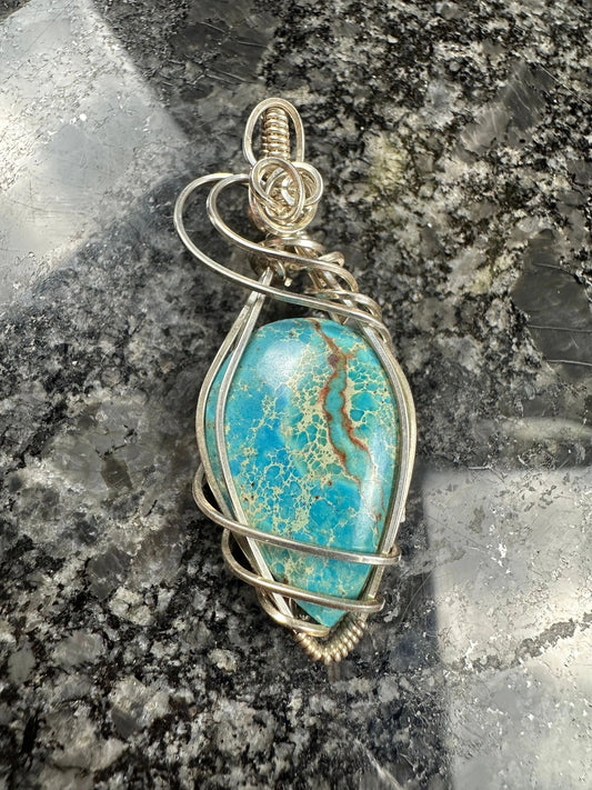 Pendant-Nevada Turquoise stone hand wrapped in Sterling Silver wire