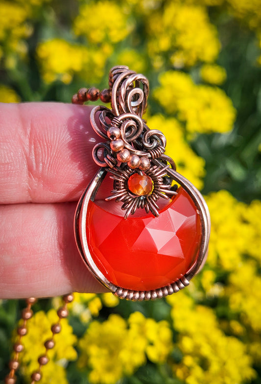 Handmade wire wrapped red onyx moon pendant with accent carnelian in copper wire