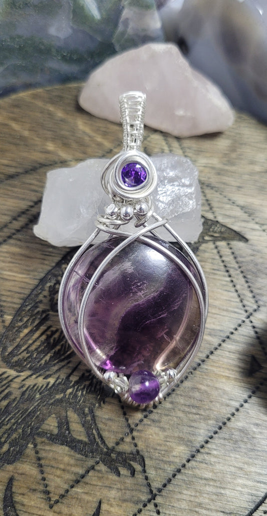 Fluorite in silver pendant.