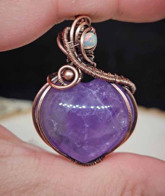 Handmade wire wrapped amethyst heart pendant with Ethiopian opal in raw copper wire