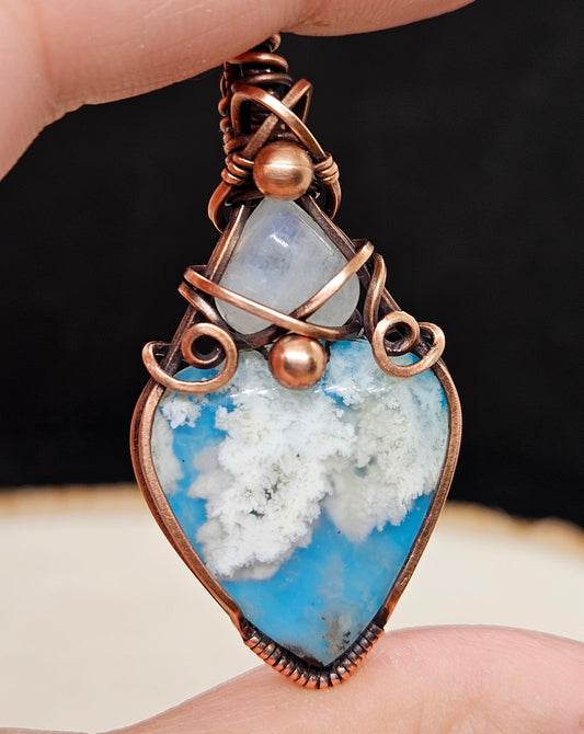 Handmade wirewrapped plume agate doublet with  moonstone pendant in copper