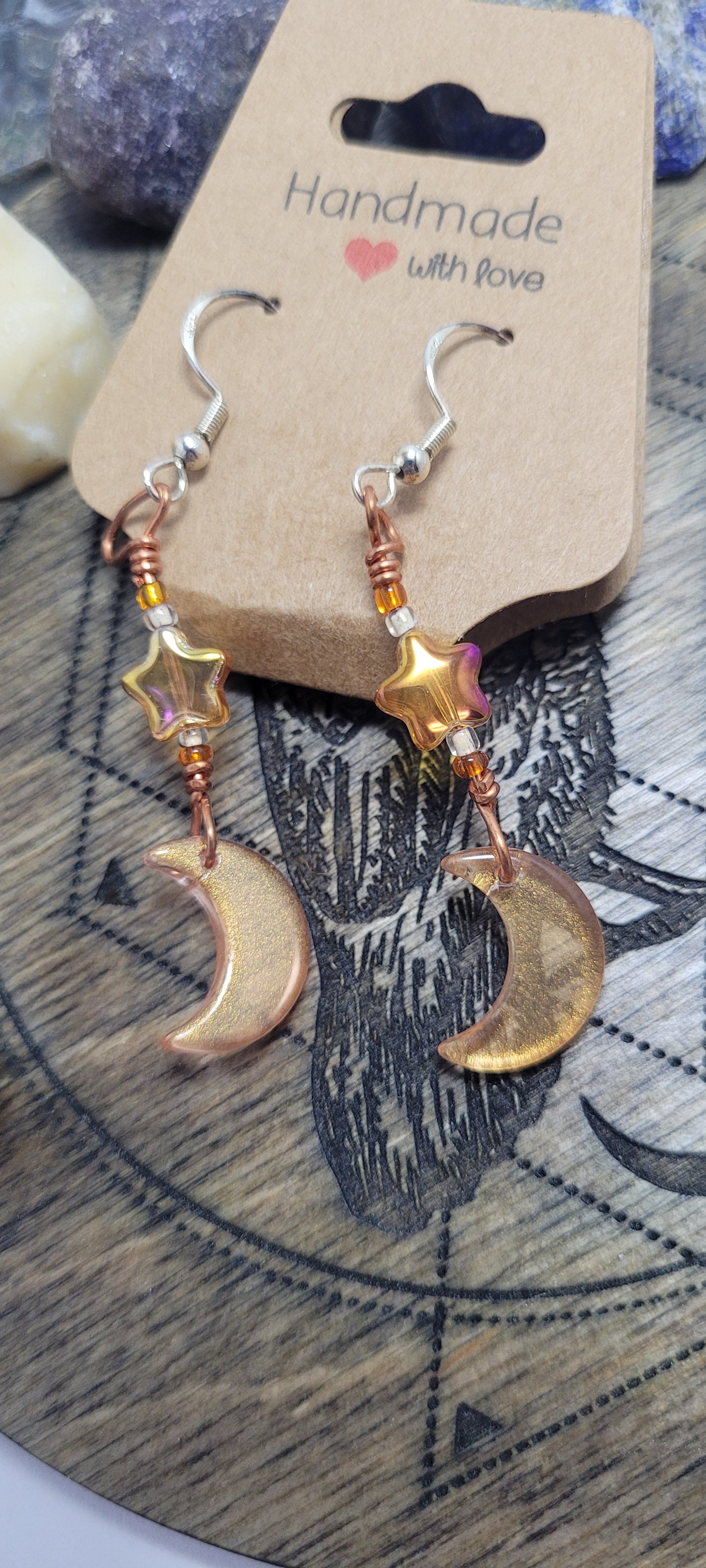 Orange glass moon earrings