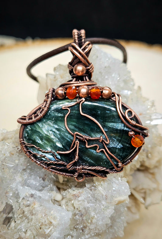 Wirewrapped beautiful seraphinite pendant in raw copper wire